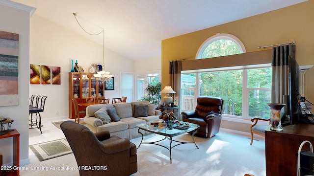 5167 Sapphire Cir, East Lansing, MI 48823 - living area with a chandelier, plenty of natural light, high vaulted ceiling, and baseboards