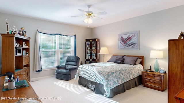 5167 Sapphire Cir, East Lansing, MI 48823 - bedroom with carpet, baseboards, and ceiling fan