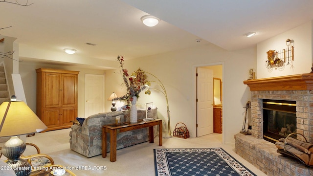5167 Sapphire Cir, East Lansing, MI 48823 - living room with light colored carpet, a glass covered fireplace, and stairway