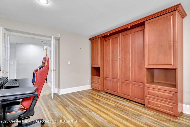 1615 Willow Creek Dr, Lansing, MI 48917 - office area with baseboards and light wood-type flooring