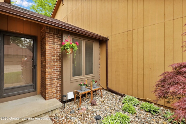 1615 Willow Creek Dr, Lansing, MI 48917 - property entrance with brick siding