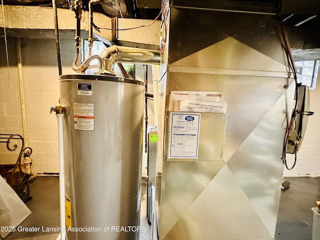 841 Huntington Rd, East Lansing, MI 48823 - utility room with gas water heater and heating unit