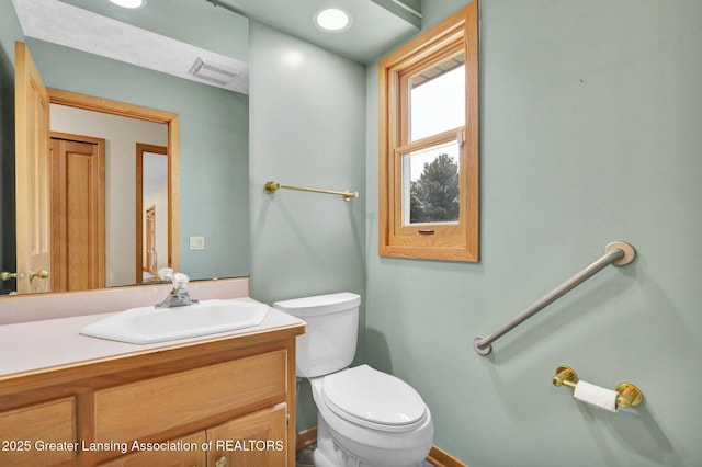 345 Linn Rd, Williamston, MI 48895 - bathroom with toilet and vanity