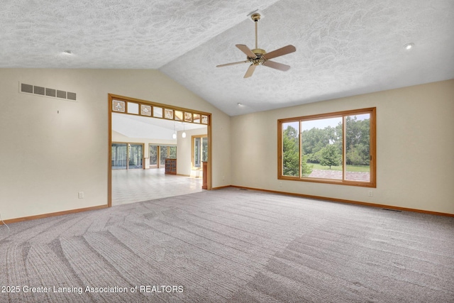 345 Linn Rd, Williamston, MI 48895 - carpeted empty room with a textured ceiling, a ceiling fan, and high vaulted ceiling
