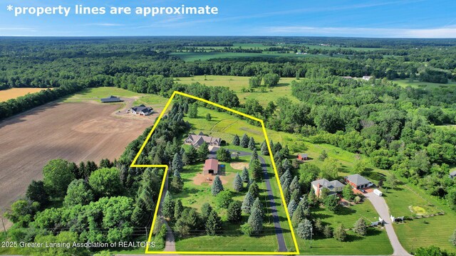 345 Linn Rd, Williamston, MI 48895 - overview of rural landscape with property parcel outlined and a forest