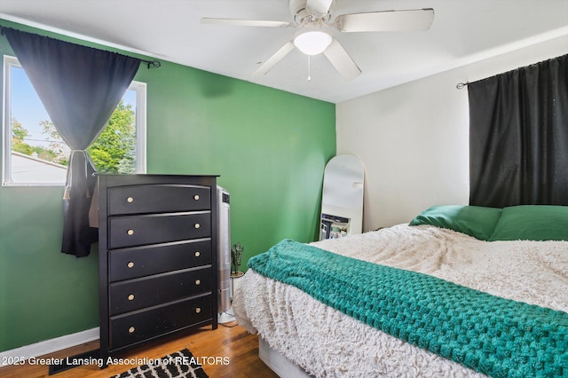 4622 Burchfield Ave, Lansing, MI 48910 - bedroom featuring wood finished floors and ceiling fan