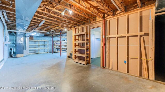 9271 W Burt Rd, Saint Charles, MI 48655 - unfinished below grade area featuring heating unit