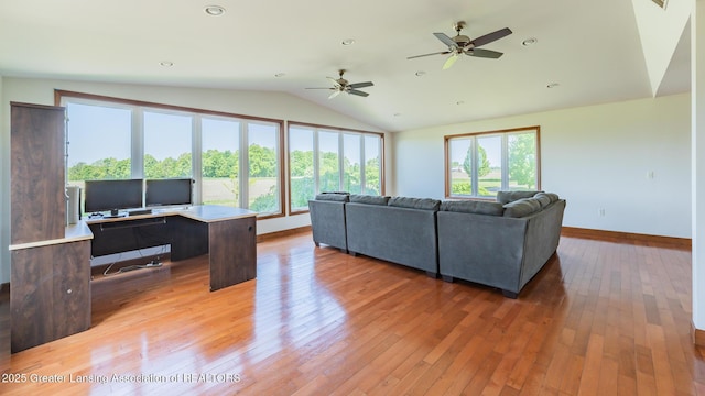 9271 W Burt Rd, Saint Charles, MI 48655 - living area with vaulted ceiling, light wood-style floors, baseboards, a desk, and ceiling fan