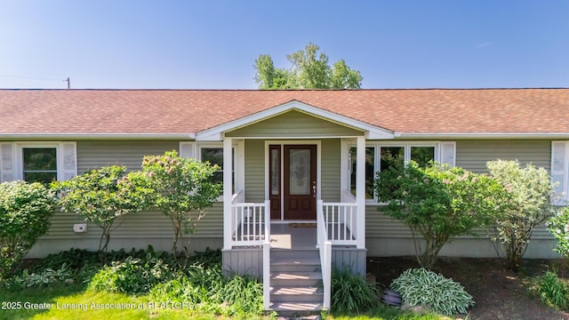 9271 W Burt Rd, Saint Charles, MI 48655 - view of front facade with a shingled roof