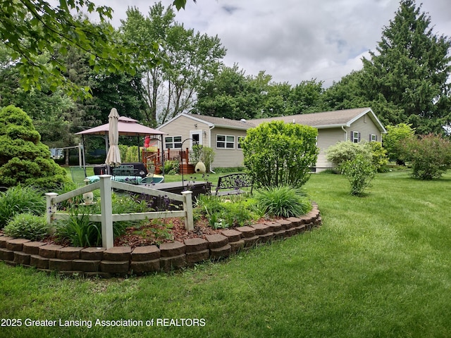 10470 Barnes Hwy, Eaton Rapids, MI 48827 - view of grassy yard with a gazebo
