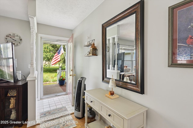 10470 Barnes Hwy, Eaton Rapids, MI 48827 - foyer with a textured ceiling