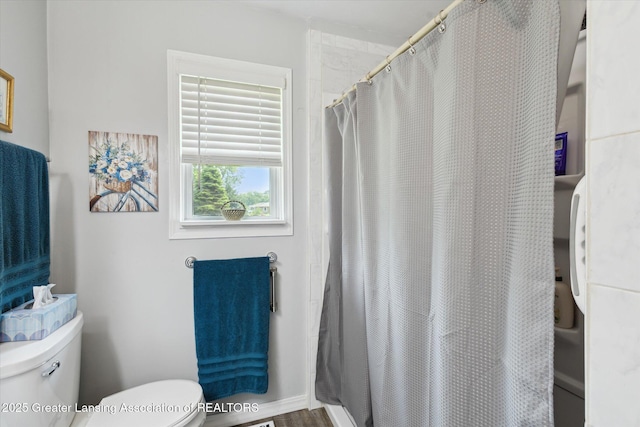 10470 Barnes Hwy, Eaton Rapids, MI 48827 - full bathroom featuring toilet and a shower with shower curtain