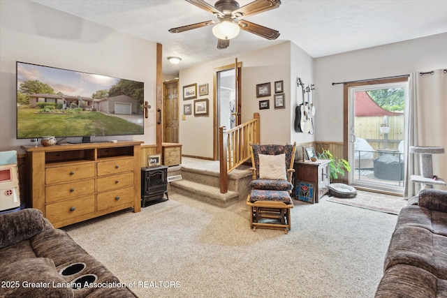 10470 Barnes Hwy, Eaton Rapids, MI 48827 - living room featuring light colored carpet and a ceiling fan