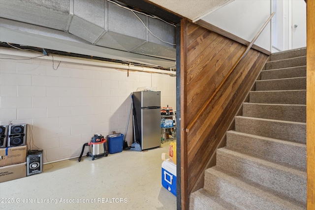 10470 Barnes Hwy, Eaton Rapids, MI 48827 - staircase featuring concrete block wall