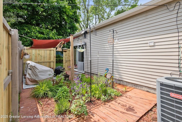 10470 Barnes Hwy, Eaton Rapids, MI 48827 - wooden terrace with cooling unit