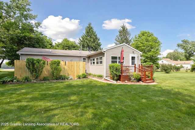 10470 Barnes Hwy, Eaton Rapids, MI 48827 - view of front of property with a wooden deck