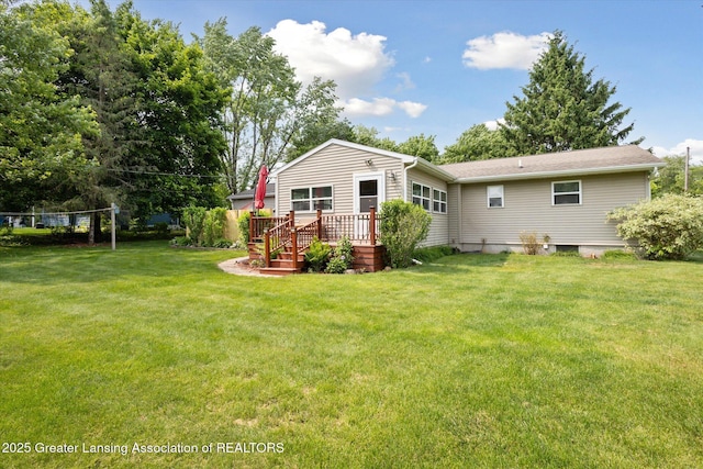 10470 Barnes Hwy, Eaton Rapids, MI 48827 - back of house featuring a lawn