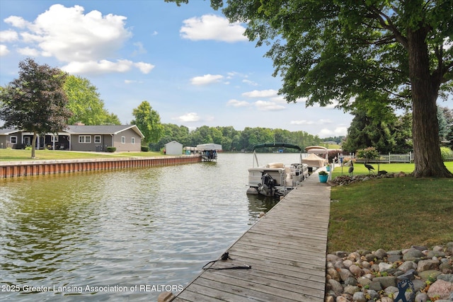 4951 Shore Ln, Perrinton, MI 48871 - dock area with a water view and a lawn