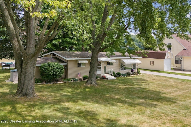 4951 Shore Ln, Perrinton, MI 48871 - view of front facade with a front yard