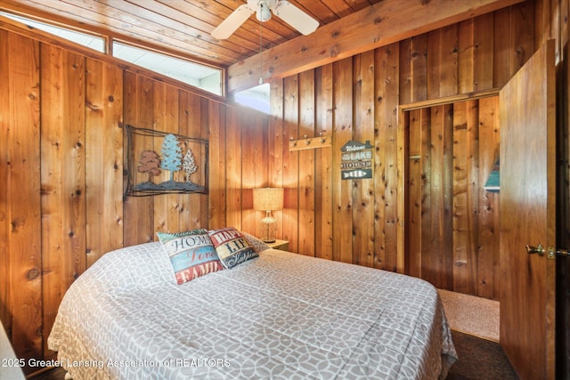 4951 Shore Ln, Perrinton, MI 48871 - carpeted bedroom with wood walls and wood ceiling
