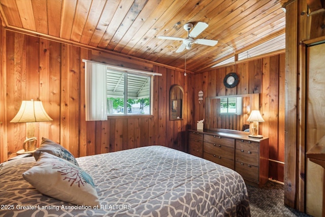 4951 Shore Ln, Perrinton, MI 48871 - bedroom featuring wood ceiling, multiple windows, vaulted ceiling, wooden walls, and dark carpet