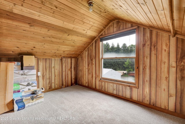 1246 House Rd N, Webberville, MI 48892 - additional living space with wood ceiling, lofted ceiling, light colored carpet, and wooden walls