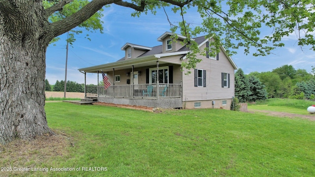 1246 House Rd N, Webberville, MI 48892 - view of front of property with a porch and a front lawn