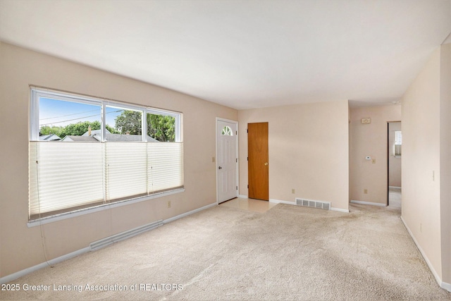 4810 Cherryland Dr, Lansing, MI 48910 - unfurnished room with light carpet and baseboards