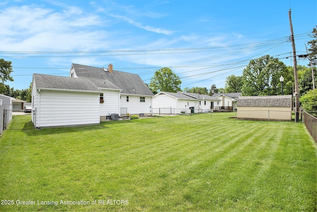 4810 Cherryland Dr, Lansing, MI 48910 - view of yard featuring central AC unit