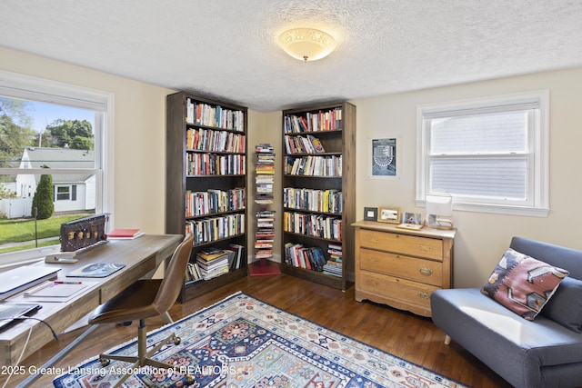 438 Bailey St, East Lansing, MI 48823 - office area featuring wood finished floors and a textured ceiling
