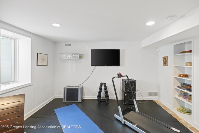 438 Bailey St, East Lansing, MI 48823 - workout room with baseboards, built in features, and recessed lighting