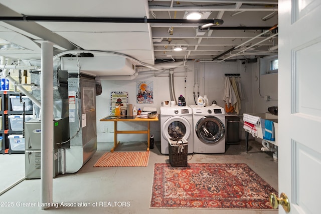 438 Bailey St, East Lansing, MI 48823 - laundry room with independent washer and dryer and heating unit