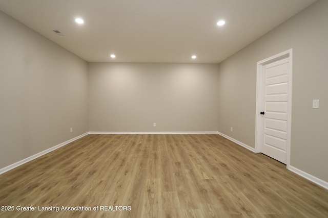 615 Magenta Ct, Haslett, MI 48840 - unfurnished room with recessed lighting, light wood finished floors, and baseboards