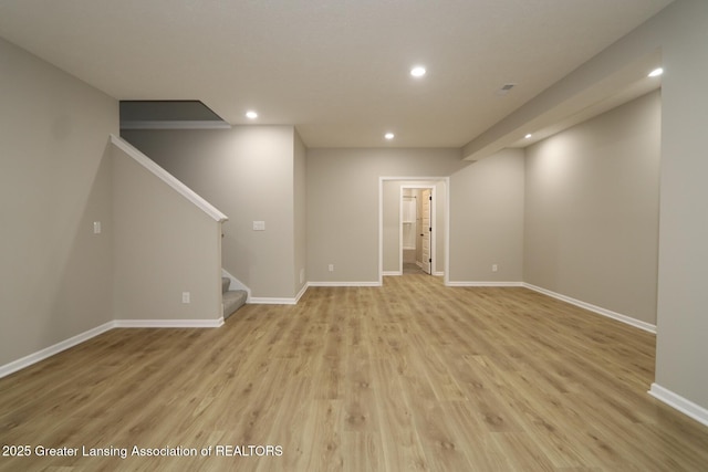 615 Magenta Ct, Haslett, MI 48840 - finished basement featuring recessed lighting, stairs, light wood finished floors, and baseboards