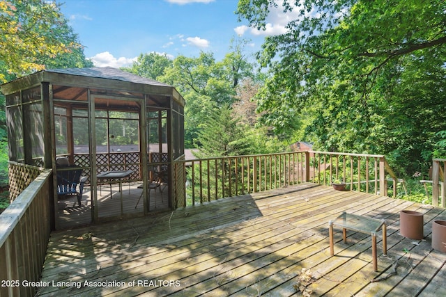 2146 Tecumseh River Rd, Lansing, MI 48906 - deck with a sunroom