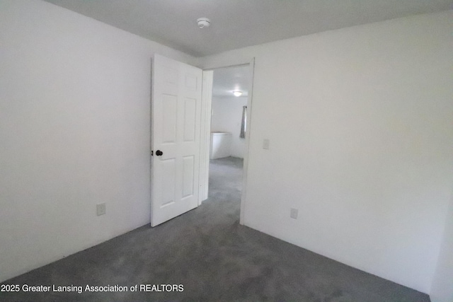 5413 S Waverly Rd, Lansing, MI 48911 - empty room featuring carpet floors