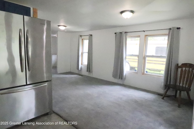 5413 S Waverly Rd, Lansing, MI 48911 - kitchen with freestanding refrigerator and carpet