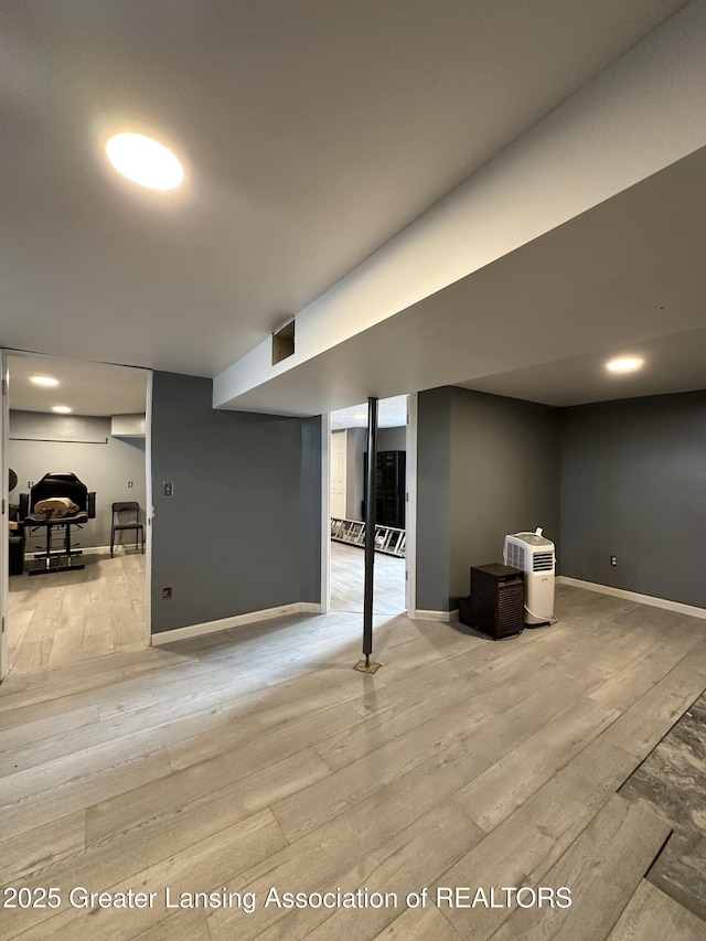 600 E Cavanaugh Rd, Lansing, MI 48910 - finished basement with wood finished floors and baseboards