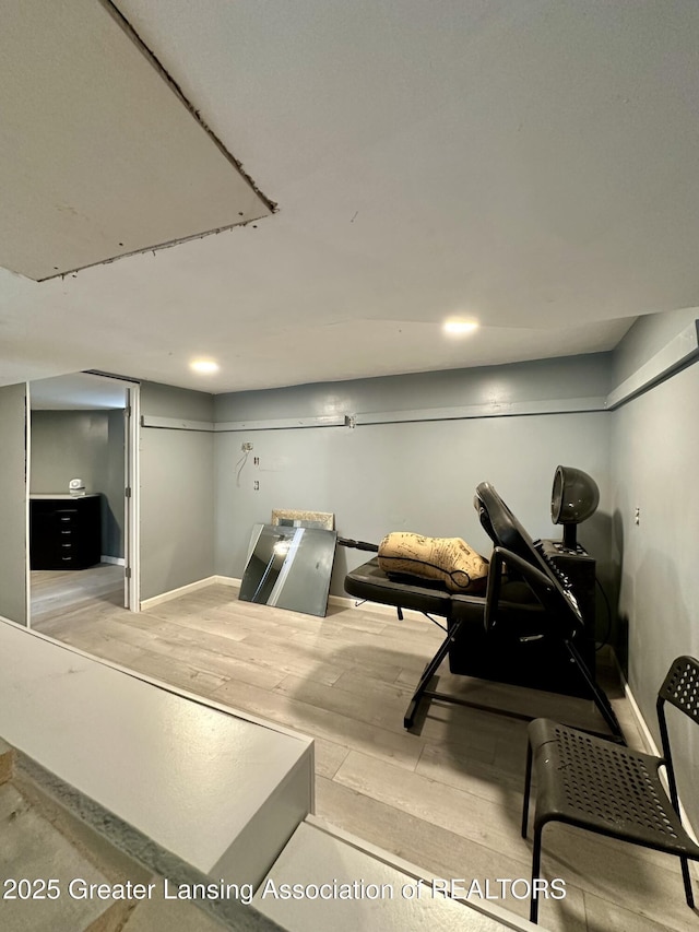 600 E Cavanaugh Rd, Lansing, MI 48910 - finished basement with baseboards and wood finished floors
