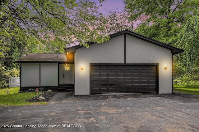 6420 Clise Rd, Bath, MI 48808 - mid-century home with a garage and entry steps