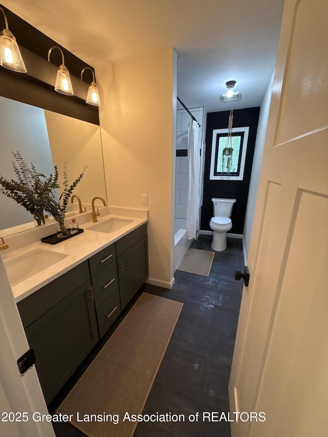 6420 Clise Rd, Bath, MI 48808 - full bathroom with double vanity, toilet, a shower with shower curtain, and baseboards