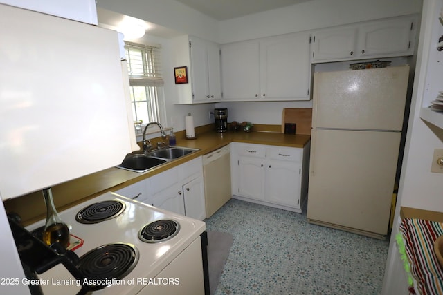 1615 Peppertree Ln, Lansing, MI 48912 - kitchen featuring white appliances, a sink, white cabinetry, and light floors