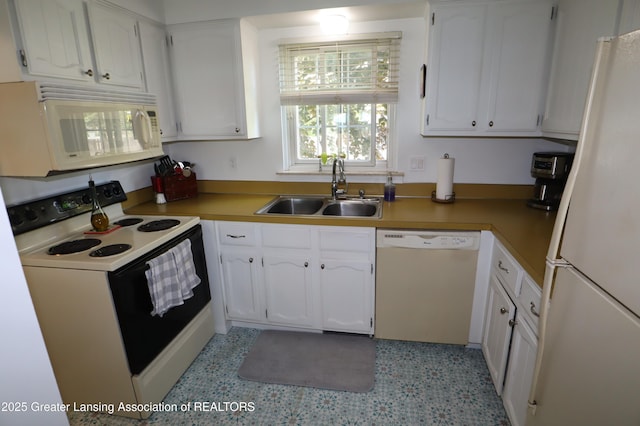 1615 Peppertree Ln, Lansing, MI 48912 - kitchen with white appliances, a sink, white cabinetry, and light countertops