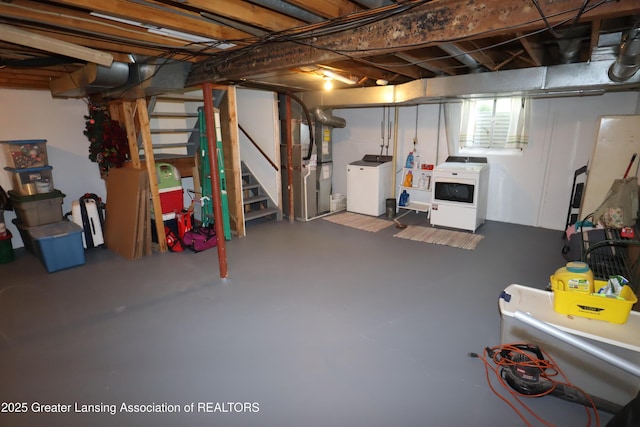 1615 Peppertree Ln, Lansing, MI 48912 - basement with washing machine and clothes dryer, heating unit, and stairs