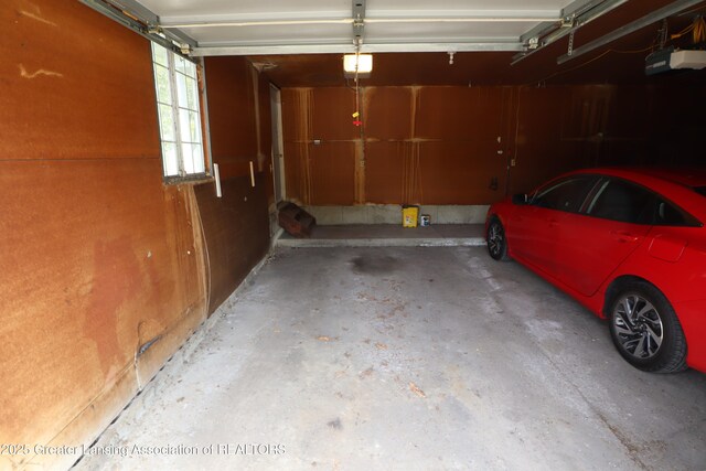 1615 Peppertree Ln, Lansing, MI 48912 - garage with a garage door opener