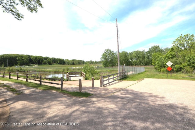 1615 Peppertree Ln, Lansing, MI 48912 - surrounding community with a water view