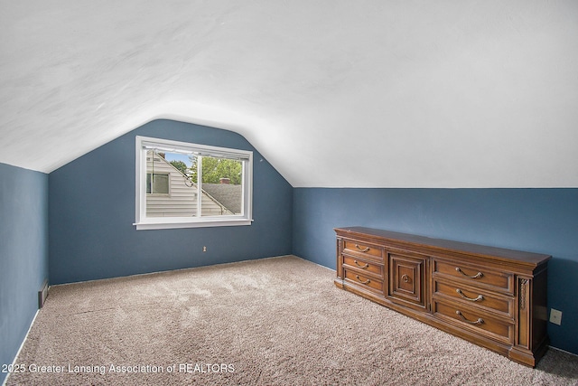 4512 Alpha St, Lansing, MI 48910 - bonus room with carpet floors and lofted ceiling