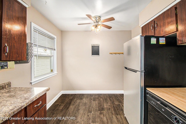 4512 Alpha St, Lansing, MI 48910 - kitchen with freestanding refrigerator, ceiling fan, baseboards, dark wood-style floors, and dark brown cabinetry