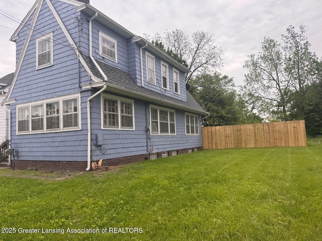 1305 W Hillsdale St, Lansing, MI 48915 - back of property featuring a shingled roof