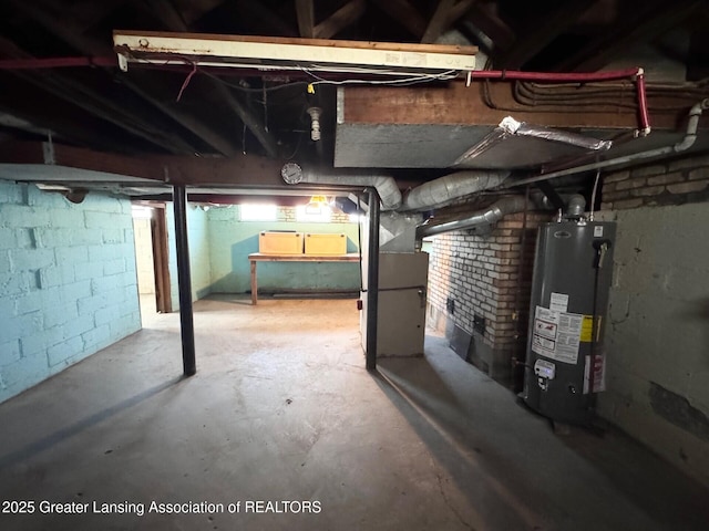 1305 W Hillsdale St, Lansing, MI 48915 - unfinished basement featuring water heater and heating unit